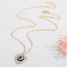 Load image into Gallery viewer, Bling Heart Evil Eye Necklace Xtina Cosmetics
